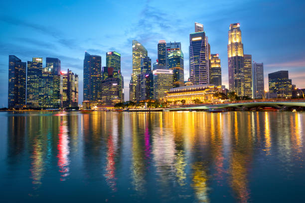 istock Singapore skyline at dusk 1192654050
