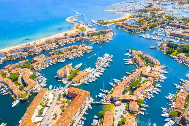 Photo of View Of Colorful Houses And Boats In Port Grimaud During Summer Day-Port Grimaud, France