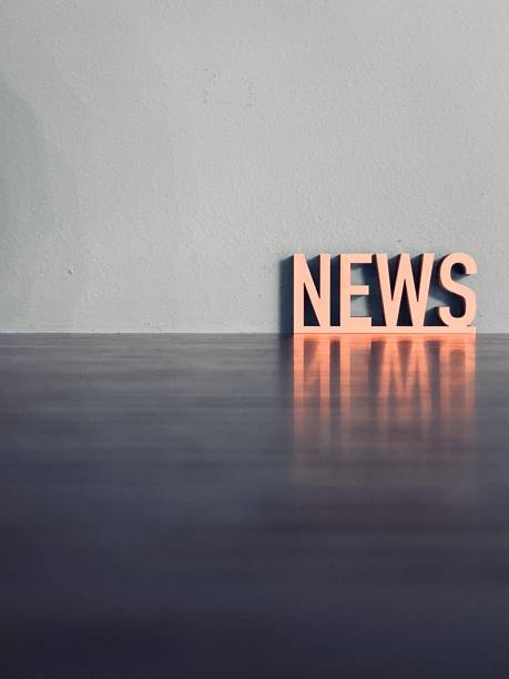 Word NEWS on blue background
