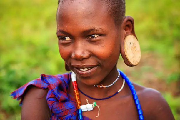 Mursi tribe are probably the last groups in Africa amongst whom it is still the norm for women to wear large pottery or wooden discs or ‘plates’ in their lower lips.