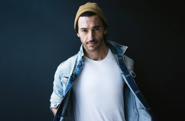 istock Handsome guy dressed in blank white t-shirt 1192659485