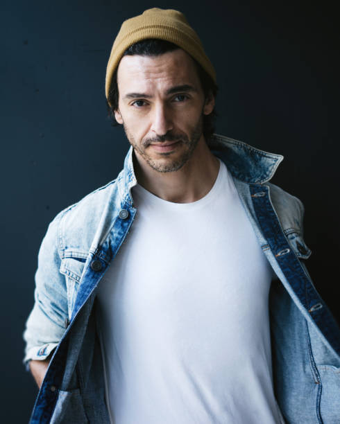 istock Handsome guy dressed in blank white t-shirt 1192659488