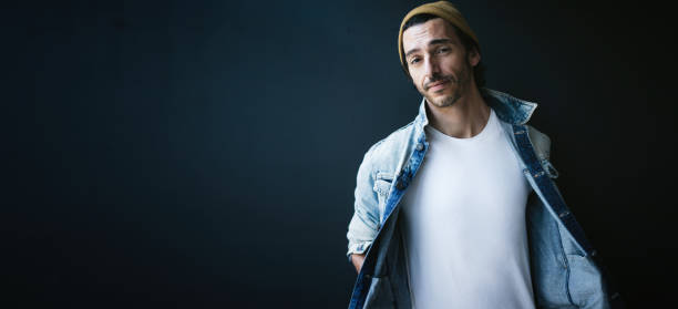 istock Handsome guy dressed in blank white t-shirt 1192659489