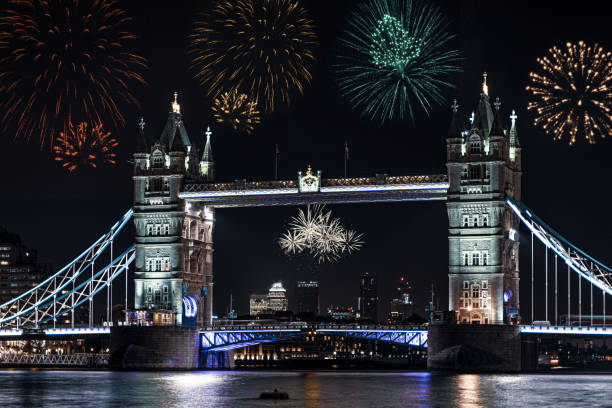 istock Londons Tower Bridge on the river Thames at night with fireworks being launched in celebration 1192661164