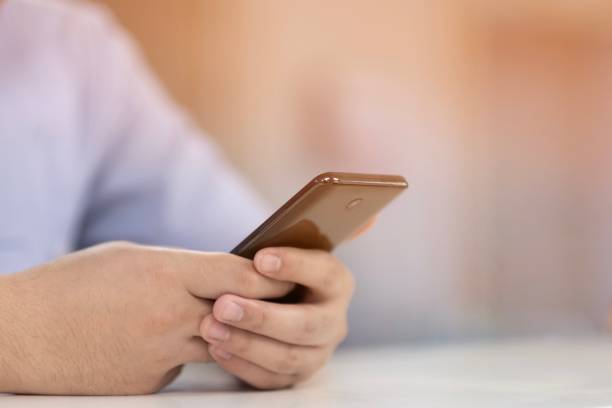 istock A man searching some data from his smartphone 1192664251