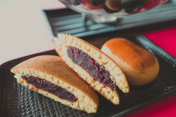 One of Wagashi. Do you know Doraemon ? Doraemon's favorite snack is this Dorayaki. I also like Dorayaki, luckily I can buy Dorayaki easily here in Singapore, lucky me :)  Great companion of green tea.\nInside of Dorayaki is red bean paste. Don't eat too much, it is high calory !