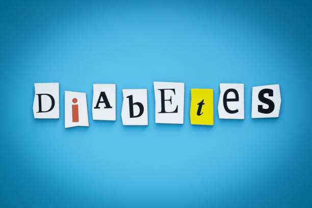 istock Text - diabetes. Single word. Cut paper letters on blue background. Writing on card. Inscription, message on banner. 1192665310