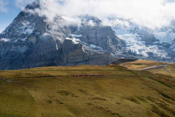 istock Scenic Swiss Alps and red train 3 1192665457