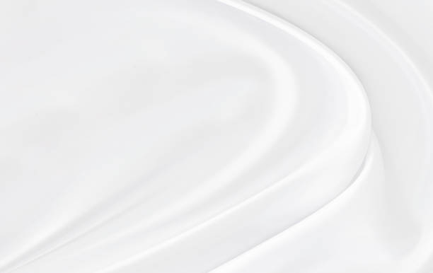 istock White gray satin texture that is white silver fabric silk background with beautiful soft blur pattern natural. 1192668771