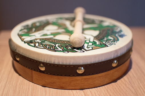 Irish bodhran drum close-up green celtic design
