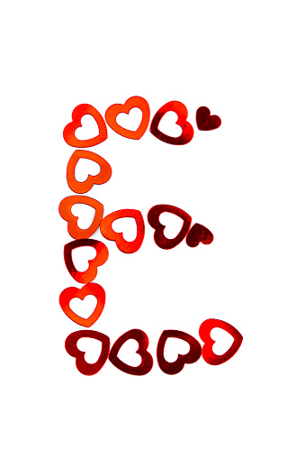 Letter E made of red hearts isolated on white background