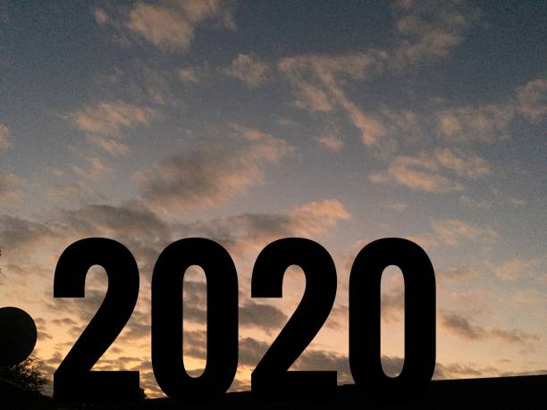 istock silhouette welcome the new year 2020 for background and abstract 1192674193
