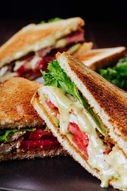 istock Sandwich bread tomato, lettuce and yellow cheese 1192677045
