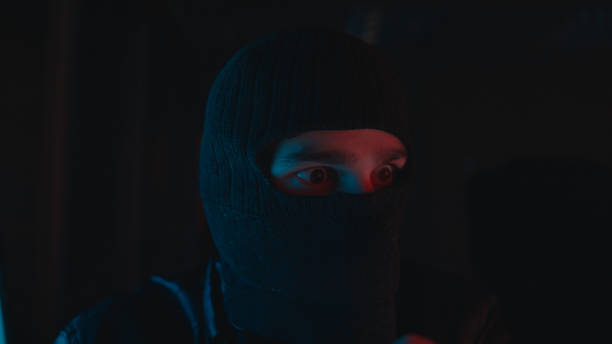 istock Portrait of a thief stealing someone's wallet. Thief concept 1192677706