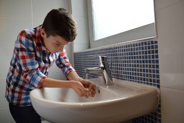 istock Washing drinking in bathroom 1192677710