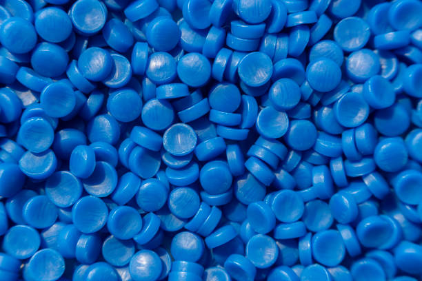 istock Close-up of plastic polymer granules. hand hold Polymer pellets. polymer plastic. compound polymer. 1192678542
