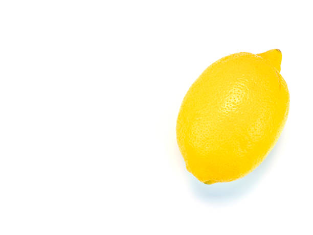 istock Yellow lemon fruit on a white background with place for text. 1192679784