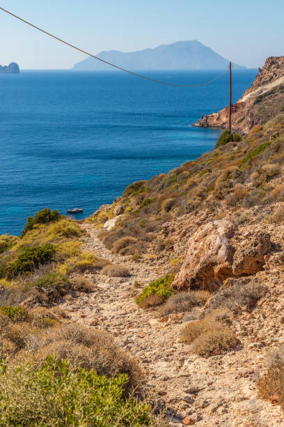 istock Trail to Fourkovouni beach with cliffs and vegetation 1192679876