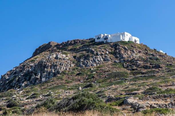 istock Buildings over mountain in Plaka village 1192681983