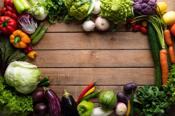 istock Healthy food, vegetables on a wooden table 1192695431
