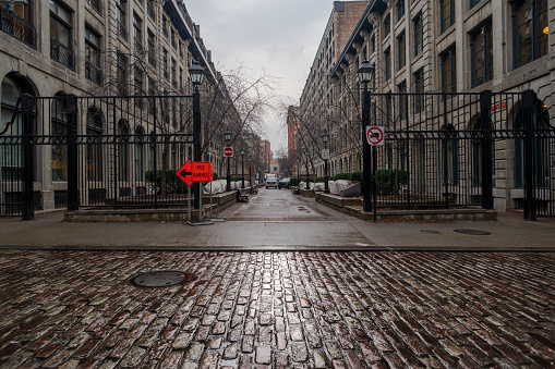 Montreal, Quebec, Canada -- November 27, 2019.   A wide-angle photo taken on a quiet side street in Old Montreal Canada.