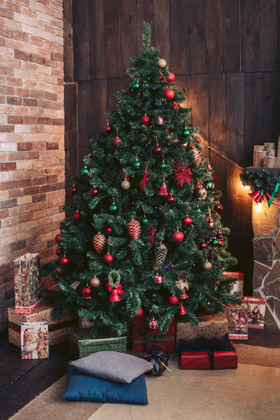 istock Big Christmas tree. Gifts under the tree. Cozy Christmas interior 1192701457
