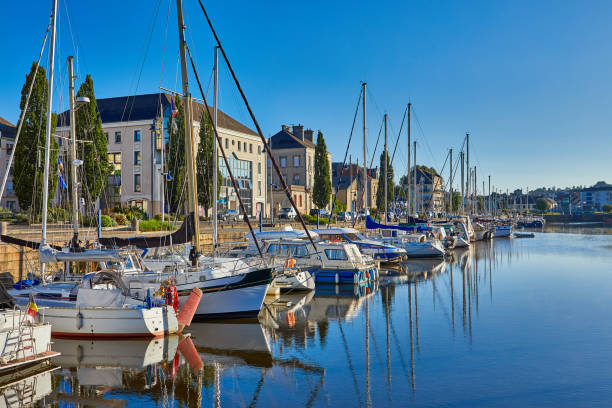 In Brittany there are many picturesque villages along the coast, where the natural phenomenon of the ocean tide is remarkable. During low tide, boats lie on the sand, waiting for the sea to ebb. Here's the port of Vannes.