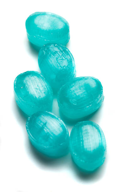 Hard candy sweets shot over white background