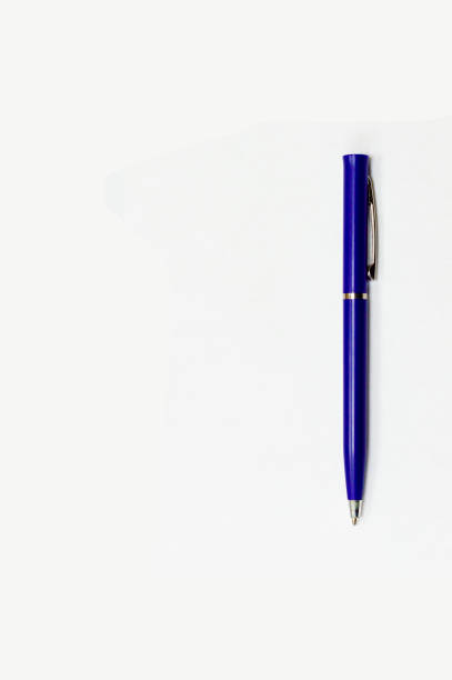 istock Blue pen on white vertical clear piece of paper. Concept isolate. 1192706731