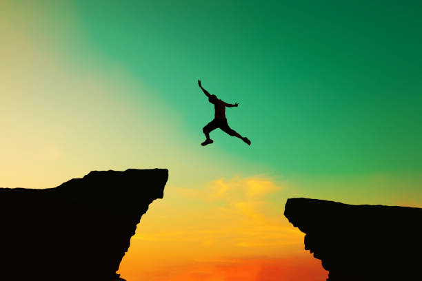 istock Men jumped from the old obstacles to new achievements. 1192709438