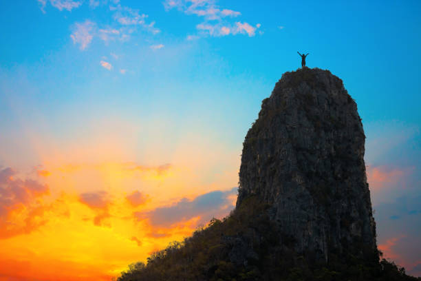 istock People who have achieved great success Standing on the highest peak 1192709449