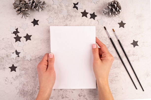 istock Mock up. Artist workspace on white table top view flat lay 1192710994