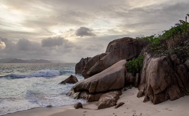 istock granite rocks at the beach, Seychelles 1192714149