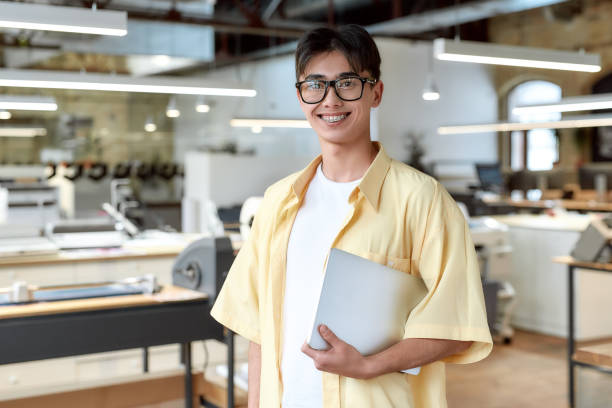 istock We need quality and quantity. New cheerful co-worker in office 1192718765