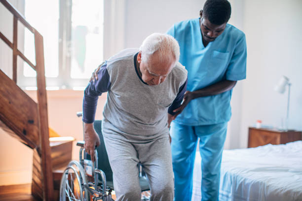 istock Male nurse and senior man 1192720050