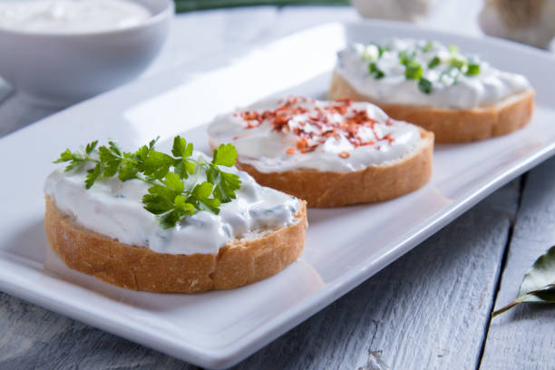 istock Sour cream spread with home made bread 1192720170