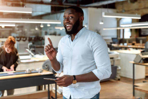 istock I have an idea. Confident male worker posing in office 1192720203