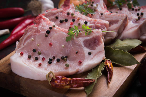 Raw pork loin chops stock photo