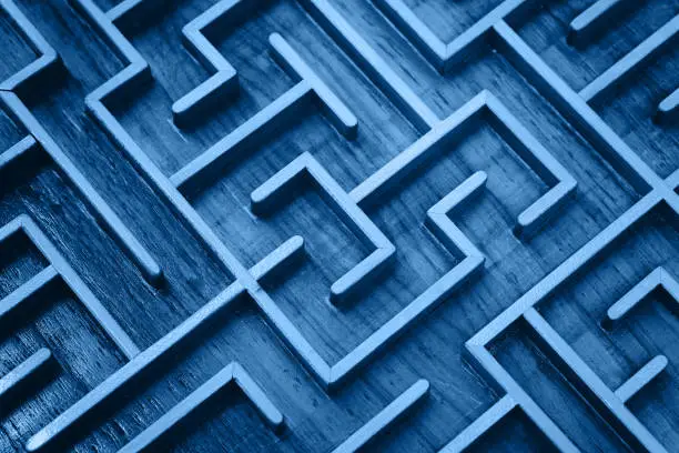 Photo of Blue wooden labyrinth maze puzzle close up