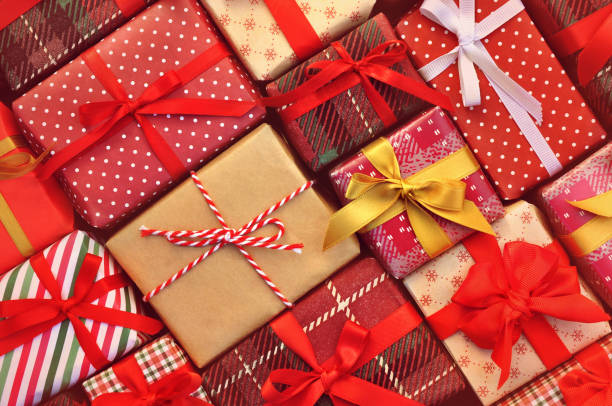 istock Gift present boxes background; festive Christmas and New Year celebration card 1192721943