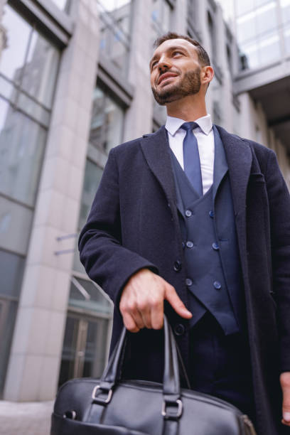 istock Delighted young man looking at business center 1192722682