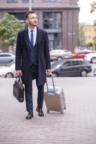 istock Handsome young male looking for business center 1192722741