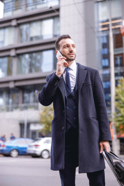 istock Positive delighted bearded man talking per telephone 1192722751