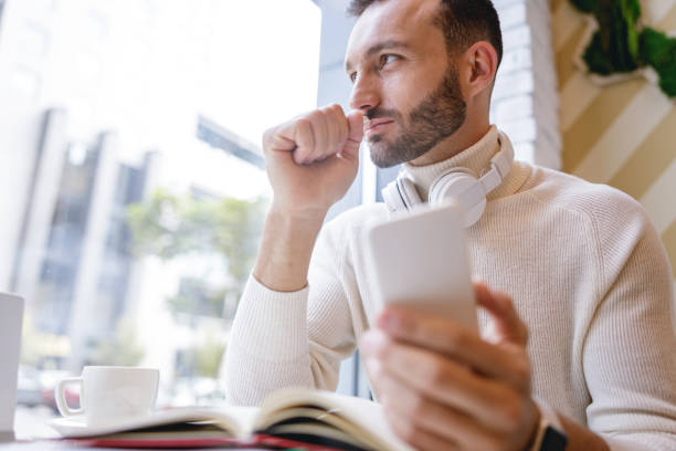 istock Kind young man being deep in his thoughts 1192722860