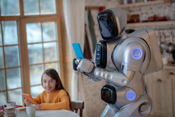 istock Robot with a tablet in his hands looking involved 1192723055