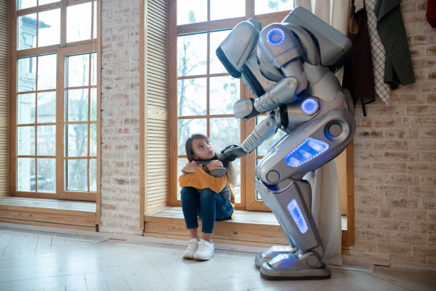 istock Big house robot touching girls shoulder tenderly 1192723076