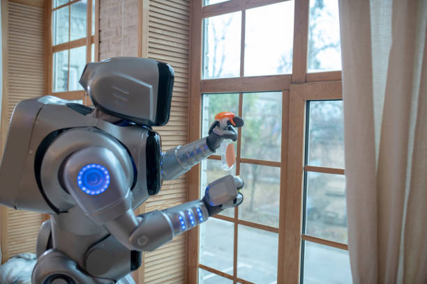 istock Big robot cleaning the window in the kitchen 1192723096