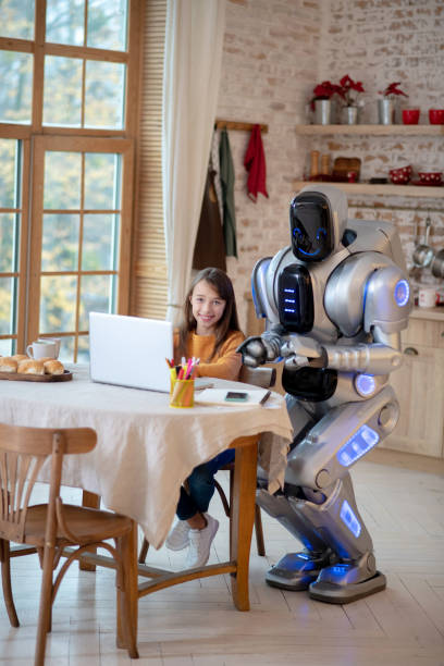 istock Dark-haired girl doing her lessons in the kitchen 1192723181