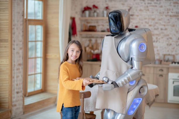 istock House robot in apron standing in the kicthen 1192723201