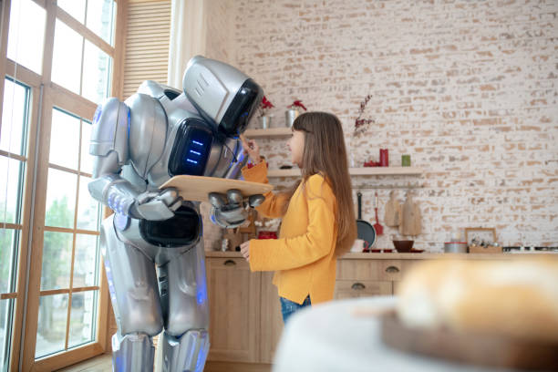 istock House robot holding a tray with meat balls 1192723214
